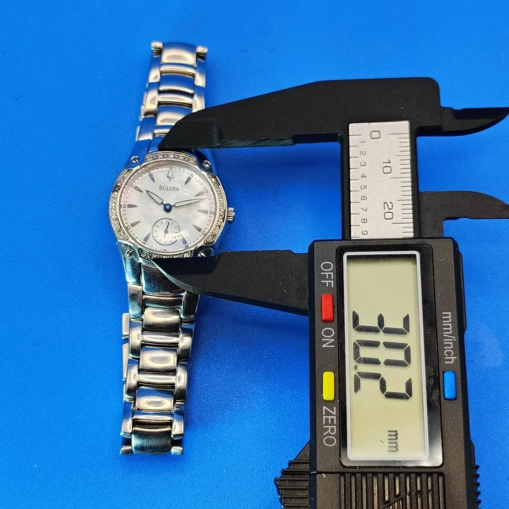 Vintage 2003 Bulova Genuine Diamond & Mother of Pearl 30mm Women's Quartz Watch